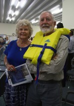 Peter Mack, with his wife Fran, attended the meeting in a lifevest, saying; "If they say this extreme inundation event is going to happen sometime in the next 500 years tonight could be the night, so I'm prepared." Picture: Jon Solmundson