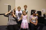 Bernadette, Luke, Jack, Isabelle and Todd Cowcher take a spin inside virtual reality. Picture: Jon Solmundson The Geraldton Guardian